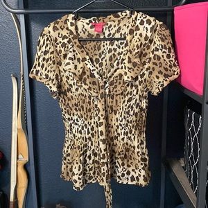 Like new cheetah print blouse with bow tie in front